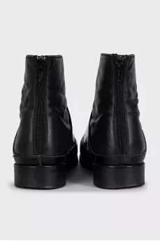 Black leather pointed toe boots