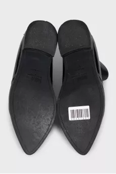 Black leather pointed toe boots