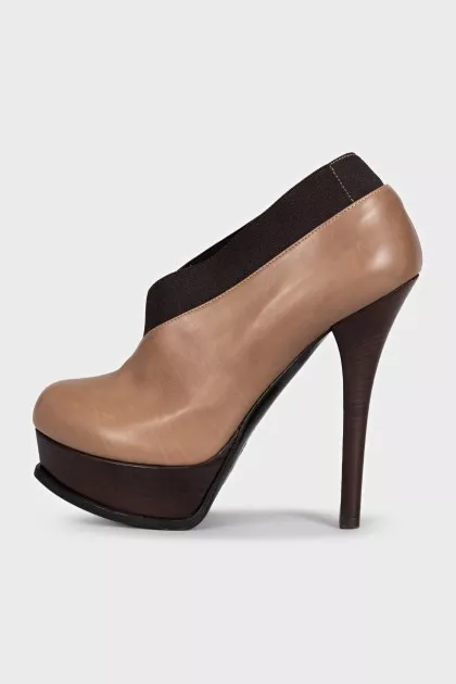 Leather ankle boots with elastic heels