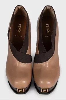 Leather ankle boots with elastic heels