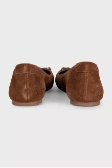 Brown suede ballet flats with a silver buckle