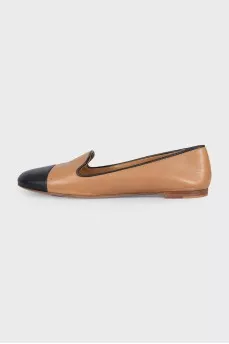 Brown leather ballet flats with black toe