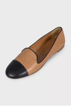 Brown leather ballet flats with black toe
