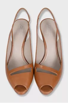Brown leather slingbacks with heels