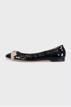 Patent leather ballet flats with a bow