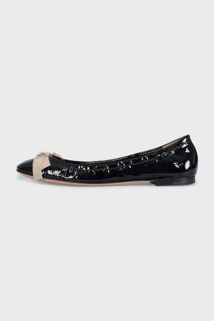 Patent leather ballet flats with a bow