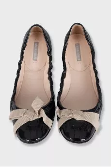 Patent leather ballet flats with a bow