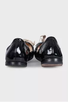 Patent leather ballet flats with a bow