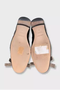 Patent leather ballet flats with a bow
