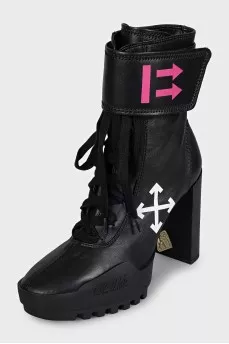 Black ankle boots with print