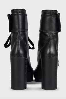 Black ankle boots with print