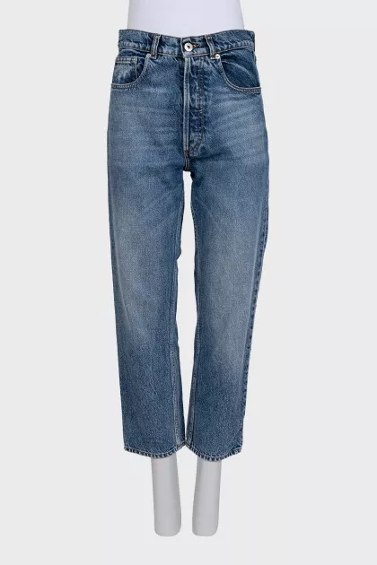 High-waisted blue jeans with distressing