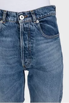 High-waisted blue jeans with distressing