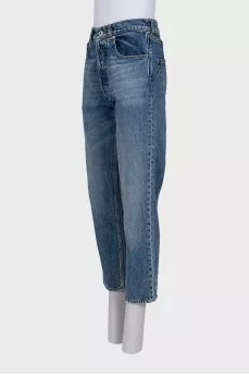 High-waisted blue jeans with distressing