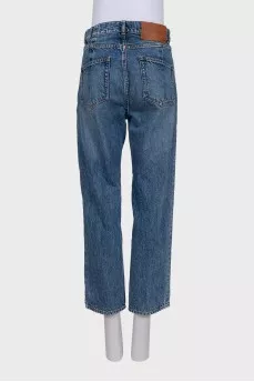 High-waisted blue jeans with distressing