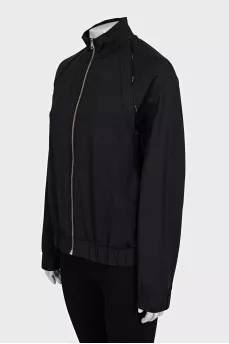 Black bomber jacket with a silver zipper