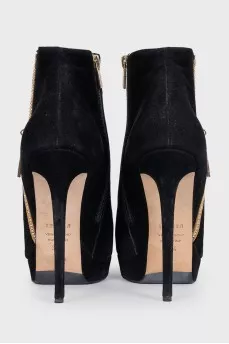 Black suede ankle boots with heels and embellishments