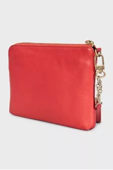 Leather clutch decorated with inscription