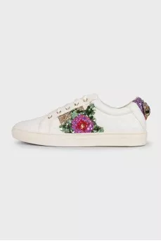 White leather sneakers decorated with sequins