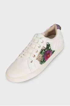 White leather sneakers decorated with sequins