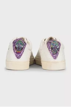 White leather sneakers decorated with sequins