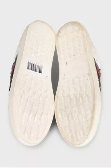 White leather sneakers decorated with sequins