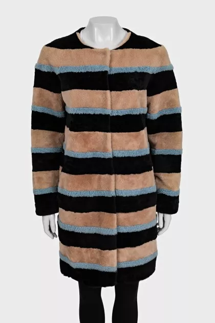 Striped fur coat made of natural fur