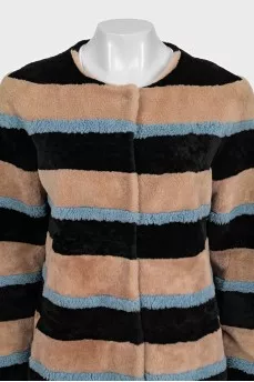 Striped fur coat made of natural fur