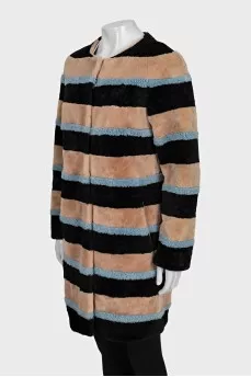 Striped fur coat made of natural fur
