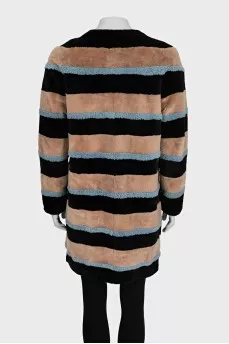 Striped fur coat made of natural fur
