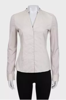 Beige fitted blouse with long sleeves
