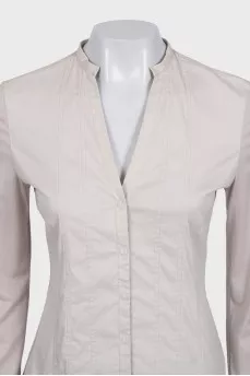 Beige fitted blouse with long sleeves