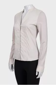 Beige fitted blouse with long sleeves