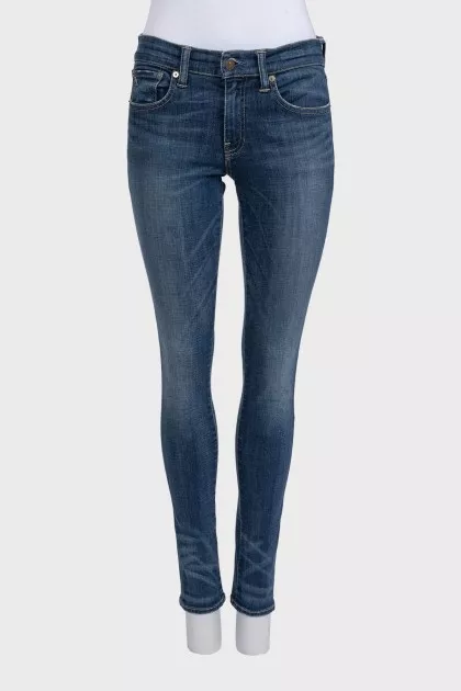 Blue skinny fit jeans with a distressed effect