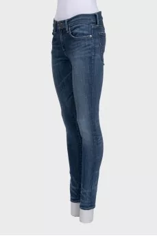Blue skinny fit jeans with a distressed effect