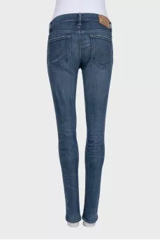 Blue skinny fit jeans with a distressed effect