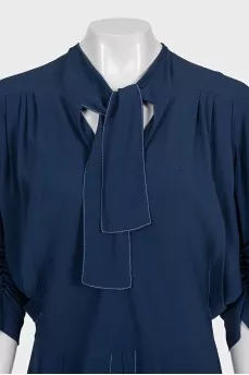 Blue fitted dress with puff sleeves