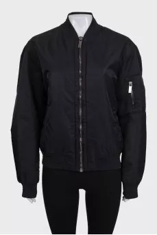 Black loose-fitting bomber jacket with a zipper