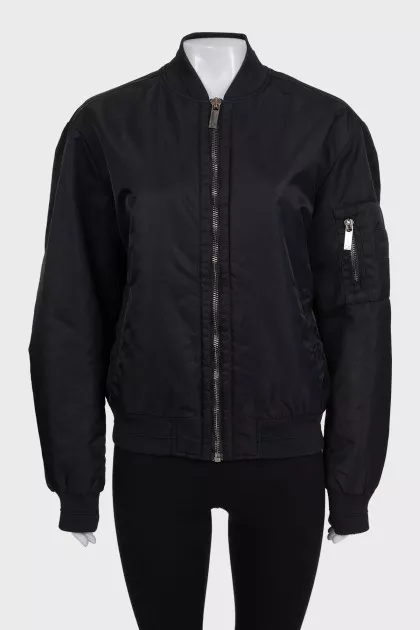 Black loose-fitting bomber jacket with a zipper