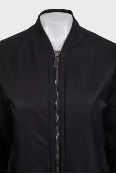 Black loose-fitting bomber jacket with a zipper