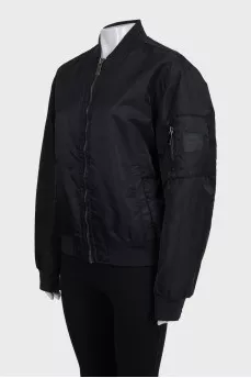Black loose-fitting bomber jacket with a zipper
