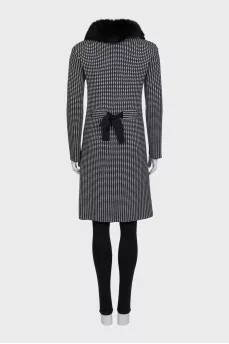 Black and white coat with a fur collar