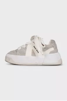 Gray suede sneakers with a chunky platform