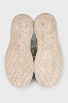 Gray suede sneakers with a chunky platform
