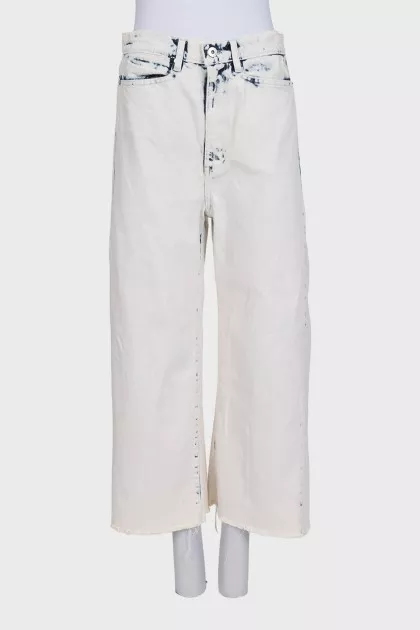 Blue wide-leg jeans with raw hem