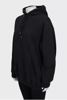 Black loose-fitting hoodie with logo