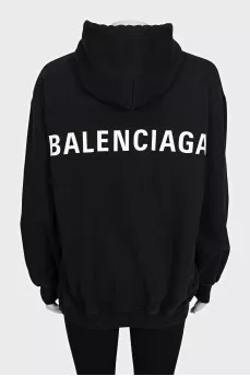 Black loose-fitting hoodie with logo