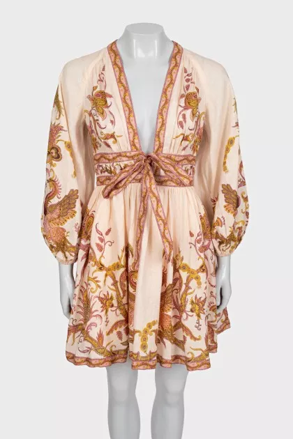 Beige fitted dress with print