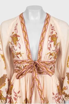 Beige fitted dress with print
