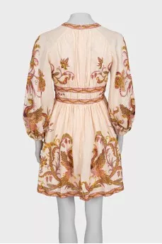Beige fitted dress with print